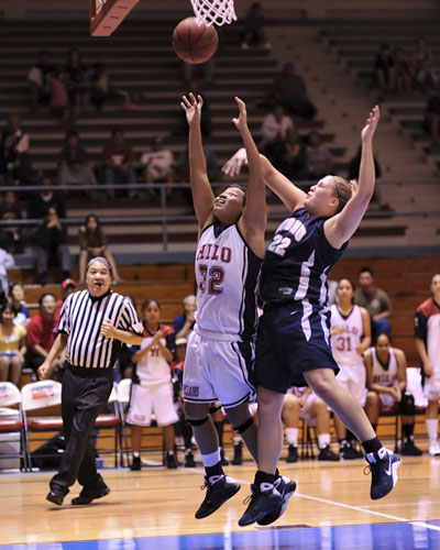 Jessica Hanato gets fouled on her jumper by Argonaut #22 Britni Rathke.