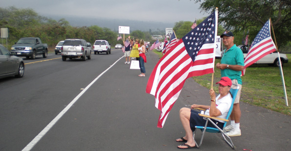 taxteaparty6 Claire Eddo displays her patriotism Wednesday in Kona for the Tax Day Tea Party. (Hawaii247.com photo by Karin Stanton)