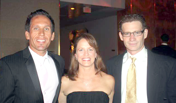 JasonLester Jason Lester is congratulated by coach Dave Ciaverella and Ciaverella's wife, Ann. (Photo courtesy of Ironman)