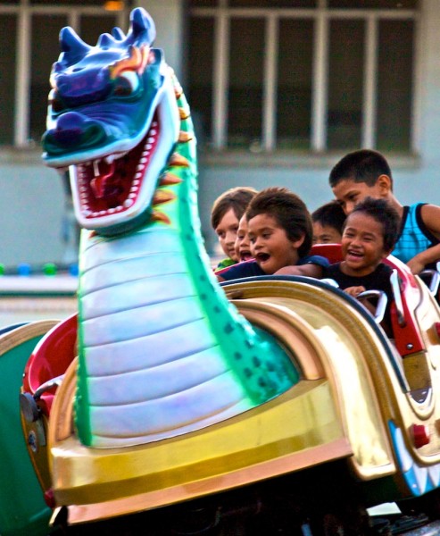 Kids enjoy a rollercoaster of a ride during the Hawaii County Fair in Hilo.