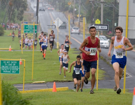 Runners head up Puainako Street during the BIIF cross country meet at Waiakea High School.