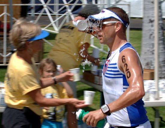 Mark James, of Great Britain, trucks though an aide station.