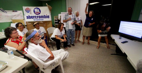 20100918_abercrombie-celebration Neil Abercrombie supporters celebrate as the second printout of primary election results show a commanding lead for the candidate.