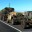 A military convoy pulls over onto the shoulder of Mamalahoa Highway (Hwy 190) to let traffic pass after exiting Saddle Road as it heads south to Waikolola Road. You probably would not want to get stuck behind this convoy on Saddle Road. Photography by Baron Sekiya | Hawaii 24/7