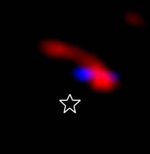 LkCa-15-b-Protoplanet-close An expanded view of the central part of the cleared region around LkCa 15, showing a composite of two reconstructed images (blue: 2.1 microns, from November 2010; red: 3.7 microns) for LkCa 15. The location of the central star is also marked. Image by Kraus & Ireland, 2011
