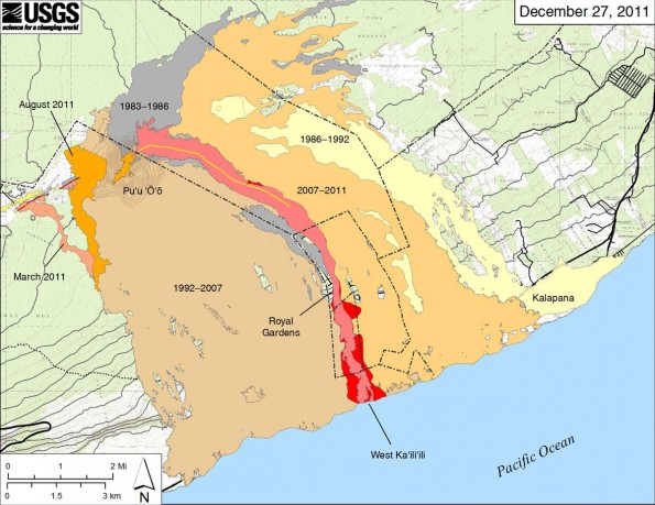 Map showing the extent of lava flows erupted during Kilauea's ongoing east rift zone eruption and labeled with the years in which they were active. Episodes 1–48b (1983–1986) is shown in dark gray; Episodes 48–49 (1986–1992) is pale yellow; Episodes 50–53 and 55 (1992–2007) is tan; Episode 54 (1997) is yellow; Episode 58 (2007–2011) is pale orange; the episode 59 Kamoamoa eruption (March 2011) is at left in light reddish orange; and the episode 60 Pu‘u ‘O‘o overflows and flank breakout (March–August 2011) is orange. The currently active flow (episode 61) is shown as the two shades of red–pink is the extent of the flow from September 21 to December 13, and bright red marks flow expansion from December 13 to December 27. The fissure eruption that started this flow opened on September 21, which was the anniversary of International Peace Day. Thus, we are informally calling this the Peace Day flow. The flow continues to enter the ocean at the West Kailiili entry site, where a narrow lava delta is being constructed
