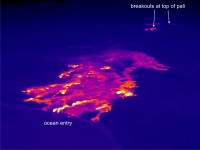 This thermal image shows the scattered breakouts on the coastal plain and the ocean entry near Kupapa`u. In addition to these coastal plain flows, several breakouts were active near the top of the pali, around the northern boundary of Royal Gardens subdivision. Photo courtesy of USGS/HVO