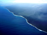 A closer view of the ocean entry, with weak plumes originating from several spots along the coast. Photo courtesy of USGS/HVO