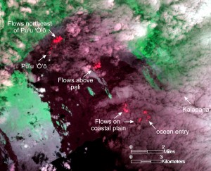 This image was captured on Wednesday, February 13, by the Advanced Land Imager sensor aboard NASA's Earth Observing 1 satellite. Although this is a false-color image, the color map has been chosen to mimic what the human eye would expect to see. Bright red pixels depict areas of very high temperatures, and show active or very recently active lava flows. The image shows three general areas of active breakouts. First, flows have been active for several weeks northeast of Puʻu ʻŌʻō, and have reached about 2 km (1.2 miles) from the Puʻu ʻŌʻō crater rim. Second, breakouts have been active above the pali, about 5 km (3.1 miles) southeast of Puʻu ʻŌʻō. Third, several scattered breakouts have been active on the coastal plain, with several patches very close to the shoreline above the active ocean entry. Satellite images such as this help fill in observational gaps between field visits.