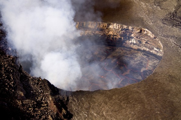 The lava lake in Halemaʻumaʻu remains poised at a relatively high level within the Overlook pit. The lake level dropped over the weekend. Though rising again now, it has not yet reached last week's level. Photo courtesy of USGS/HVO