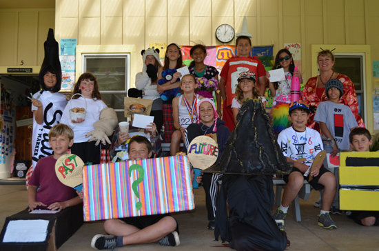 Parker School fifth graders stand with their teacher Mrs. Weiser after their vocabulary parade in February. (Photo courtesy of Parker School)