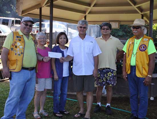 (From left) Kona Lions Club President Joey Gusman; WHCHC Board of Directors member Joan Gannon, WHCHC Board of Directors President Terri Toki; WHCHC Executive Director Richard Taaffe; WHCHC Board of Directors member Mike Matsukawa; Past International Director and Lions Club of Kona Officer Maurice Kahawaii. (Photo courtesy of Lions Club)