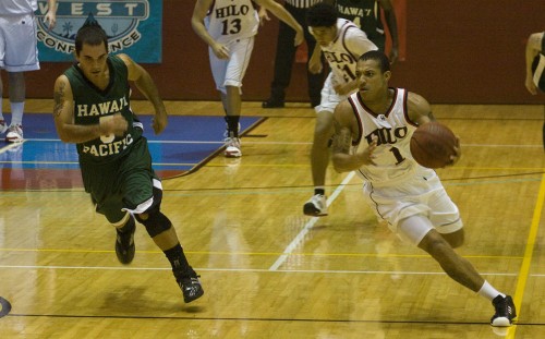 20090102_jacob-avilla-charlando-brown UH-Hilo Vulcan Charlando Brown (1) gets a steal during the first half of action against the Hawaii Pacific Sea Warriors. HPU's Jacob Avilla (5) pursues.