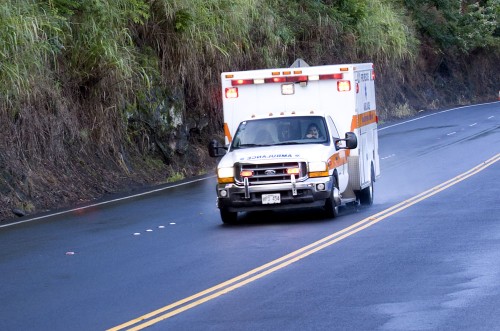 20090108_medic Medics transport victims of an accident on Highway 19.