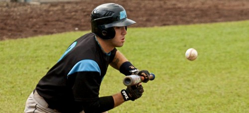 20090227_alex-agortsas-bunt Hawaii Pacific University's Alex Agortsas squares to bunt during the first game of a doubleheader against UH-Hilo Friday afternoon. HPU won this first game 5-2 but dropped the second game 3-4 at Wong Stadium.