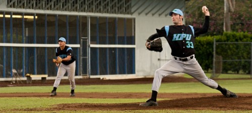 20090227_hpu-caelan-omeara HPU pitcher Caelan O'Meara (33) fires a pitch off the mound in the second game of a doubleheader against UH-Hilo at Wong Stadium. The Vulcans lost the first game 2-5 and won this second game 4-3 against the Sea Warriors.