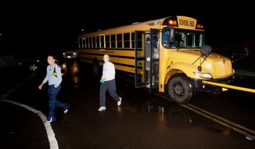20090322_marathon-bus Runners arrive at Kulaimano Park in Pepeekeo for the 6 a.m. start of the 12th Annual Big Island International Marathon.