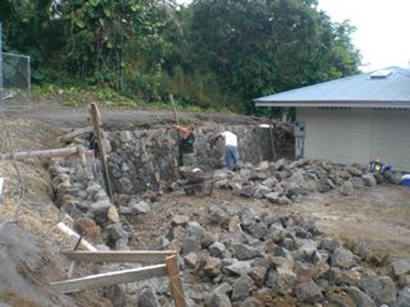 higashihara32309 Work on the rock walls near the bathrooms is well underway Monday, March 23. More volunteer masons and carpenters are needed. (Photos courtesy of Cliff Kopp)