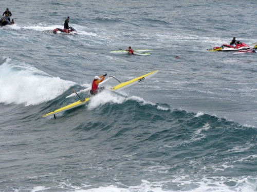 img_0008 OC-1 paddler Sheila Cadaoas powers over a wave during the Hurricane Keokea Invitational canoe race. Cadaoas finished with a time of 1:32:41.5. Photo by Vytas Katilius/Special to Hawaii247.com
