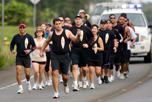 20090418_torchrun-keaau On Saturday, April 18, the officers and supporters will be in Kea'au for the East Hawai'i Torch Run. Participants will begin at 8:30 a.m. at the Kea'au police station. The "Flame of Hope" will be carried to the Kea'au High School track via Kekula Street. Its arrival at the track will signify the start of the Special Olympics track and field games scheduled for that morning.