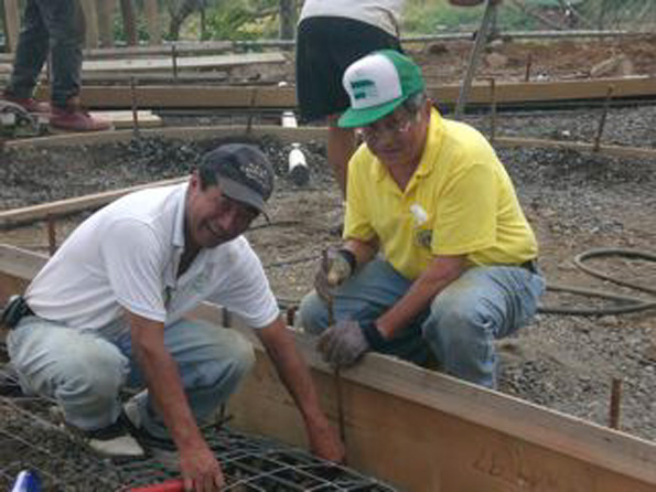 higashiharalions Members of the Lions Club do preparation work before the concrete pour for the second pavilion and walkway. (Photo courtesy of Cliff Kopp)