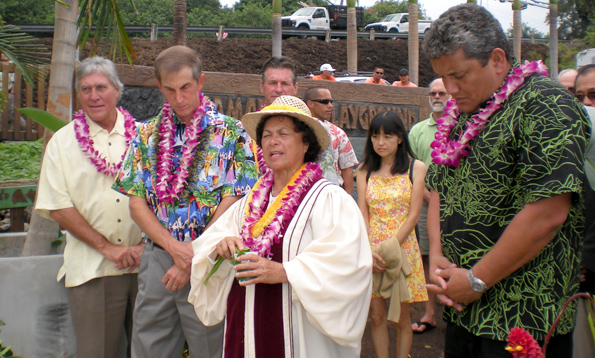 higashiharablessing Parks and Rec director Bob Fitzgerald, Cliff Kopp and Mayor Billy Kenoi join Kahu Meilani McComber in blessing the new playground Tuesday, May 12. (Hawaii247.com photo by Karin Stanton)