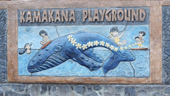 Higashihara Park Reopening A carved sign welcome keiki to the refurbished Kamakana Playground. (Hawaii247.com photo special by Brad Ballesteros)