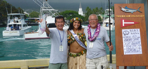 HIBT5Winners Kihachiro and Tetsuzo Suzuki pose for their championship photo with Miss Billfish 2009 Andria DeBina after Friday final day of fishing. (Photo courtesy of Current Events)