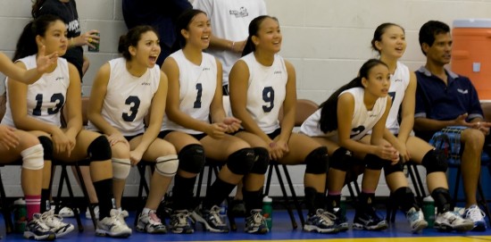 20090930_waiakea-cla-gvball02 Waiakea players watch their teammates during their match against Christian Liberty Academy.