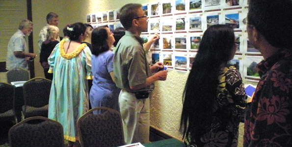 HonokohauCharrette-t Charrette participants vote on how they would like Honokohau Village to look. (Hawaii247 photo by Karin Stanton)