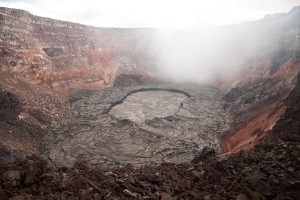 20110421_puu-oo-lava-lake A small lava lake, confined by slightly elevated levees, is active at the bottom of Pu`u `Ō `ō crater. The lake is roughly the same size as a football field.