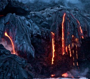 20091204_lava-flow-ocean-night-dripping Lava pours and drips towards the ocean Lava flows into the ocean off the Waikupanaha bench west of Kalapana. Hawaii 24/7 file photo