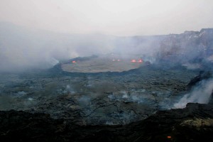 20110610_cheliker_0054_L The lava pond in Pu`u `Ō `ō Crater has rebuilt its retaining walls and is once again perched 3-5 m (10-16 ft) above the surrounding crater floor. Photo courtesy of USGS/HVO