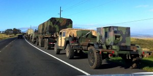 A military convoy pulls over onto the shoulder of Mamalahoa Highway (Hwy 190) to let traffic pass after exiting Saddle Road as it heads South to Waikolola Road. Hawaii 24/7 File Photo