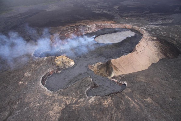 20110721_7570_torr_L Over the past few days, lava has filled the floor of the Puka Nui pit (lower left) and the MLK pit (lower right) on the west end of Pu‘u ‘O‘o. Photo courtesy of USGS/HVO