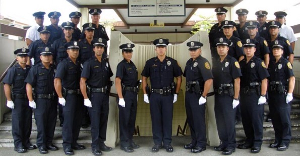 OLYMPUS DIGITAL CAMERA The 79th Recruit Class—(bottom row): Joshua K. Pa, Kelsey K. Kobayashi, Bruce I. M. Parayno, Jensen X. Rodrigues, Chelsey W. Heidenfeldt, Officer Aaron Carvalho (Instructor), Vaughn S. Kelii, Brad L. Resureccion, Branden K. Watanabe, Amy C. Masuyama, (Middle Row): Wyatt K. Kaili-Leong, Peter P. Tourigny, Roland A. Kuamoo, Aaron M. Tanaka, Nicholas C. K. McDaniel, Hanalei S. Pagan (top row): Aaron K. Kaeo, Kelena D. Ho'okano, Keng C. Singleton, Dwayne E. Sluss, Derek Kenison Jr., Jonathan K. Kailiuli, Robert A. K. Ayau, Ernest B. K. Texeira.