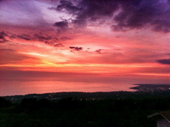 20111002_after-sunset-kona Just after sunset in Kailua-Kona as seen from Holualoa Sunday (Oct 2). With some color saturation help from Snapseed on the iPhone. Photo by Baron Sekiya | Hawaii 24/7