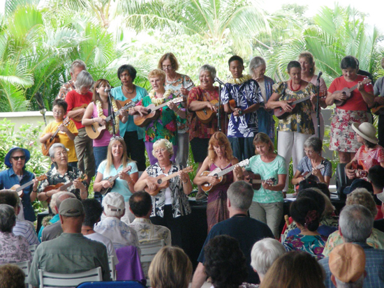 Roy Sakuma performs with his workshop students at the 2012 Great Waikoloa Ukulele Festival. (Photo courtesy of Queens' MarketPlace)