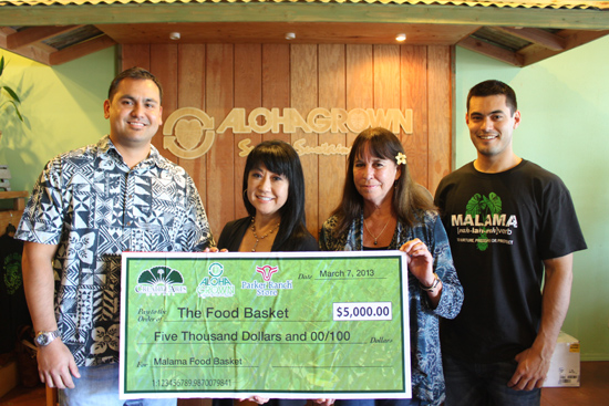 At Aloha Grown store in downtown Hilo, The Food Basket executive director En Young, Creative Arts Hawaii, vice president Connie Kurohara, Parker Ranch Store, manager Tracey Akau and Aloha Grown, manager Tyler Owens. (Photo courtesy of The Food Basket)