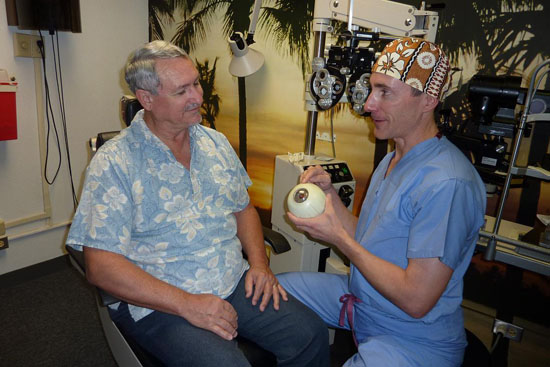 Dr. Christopher Tortora talks with a patient about dry eye disease. (Photo courtesy of Hawaiian Eye Center)