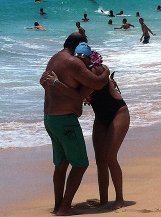 Charlie Camacho and daughter Leahi at Sandy Beach after she completed the 26-mile trek. (Photo courtesy of Paul Johnson)