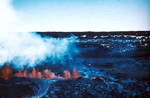 Hawaii Volcanoes National Park. 1940 eruption of Mauna Loa Volcano. Flows and fountain at Mokuaweoweo, the summit caldera. Photo by G.O. Fagerlund, April 9, 1940. Courtesy of USGS