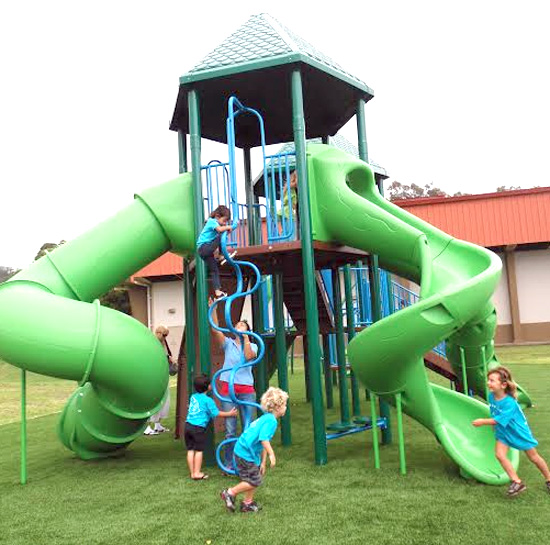 Keiki enjoy the new playground at Honokaa Park. (Photo courtesy of Department of Parks and Recreation)
