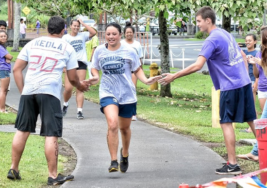Students complete a rigorous 6-mile bike course around the Keaau campus. (Photo courtesy of Kamehameha Schools)