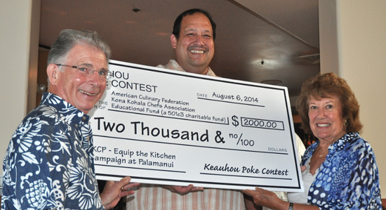 Kamehameha Schools Land Asset Manager Les Apoliona (center) presents a check for the Equip the Kitchens Campaign to James Lightner, Hospitality and Tourism Program coordinator of UH-Hawai‘i Community College and Jean Hull, Equip the Kitchens campaign manager of ACF Kona Kohala Chefs. (Photo courtesy of Kamehameha Schools)