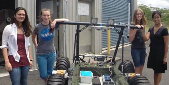 From left, Catherine Cauley, Sage Doreste, Emily Strawn, and Mari-Ela David Chock with the PISCES Rover during the STARS workshop. (Photo courtesy of PISCES)