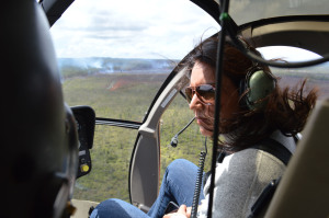 Rep. Tulsi Gabbard on a helicopter with Hawaii County officials to get a close look at the Kilauea June 27th Lava Flow, its path toward Pāhoa, access roads in and out of Puna, including the work on Chain of Craters Road. Photo courtesy Rep. Gabbard’s office