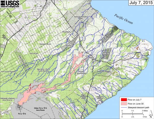 This small-scale map shows Kīlauea’s active East Rift Zone lava flow in relation to lower Puna. The area of the flow on June 30 is shown in pink, while widening and advancement of the flow as of July 7 is shown in red. The blue lines show steepest-descent paths calculated from a 1983 digital elevation model (DEM; for calculation details, see http://pubs.usgs.gov/of/2007/1264/). Steepest-descent path analysis is based on the assumption that the DEM perfectly represents the earth's surface. DEMs, however, are not perfect, so the blue lines on this map can be used to infer only approximate flow paths. Puʻu ʻŌʻō lava flows erupted prior to June 27, 2014, are shown in gray.