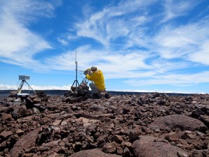 An HVO geologist performs a routine check of the thermal camera and webcam at the summit of Mauna Loa. Photo taken Saturday, September 19, 2015 courtesy of USGS/HVO
