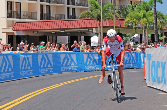 Jan Frodeno of Germany finishes first in the 112-mile (180.25 km) bicycle ride during the Ironman World Championship on Oct. 10 2015, Kailua Kona, Hawaii. (Photo by Jason Rappaport/IRONMAN)